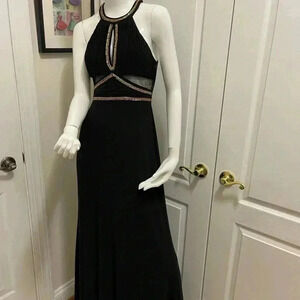 Beaty & Adam Stunning black evening dress. Very chic and elegant.